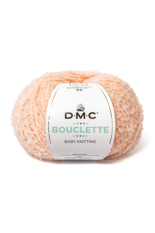 Ovillo de 37% lana 36% poliamida y 27% acrílico de la marca DMC. El modelo es Bouclette en el color 104