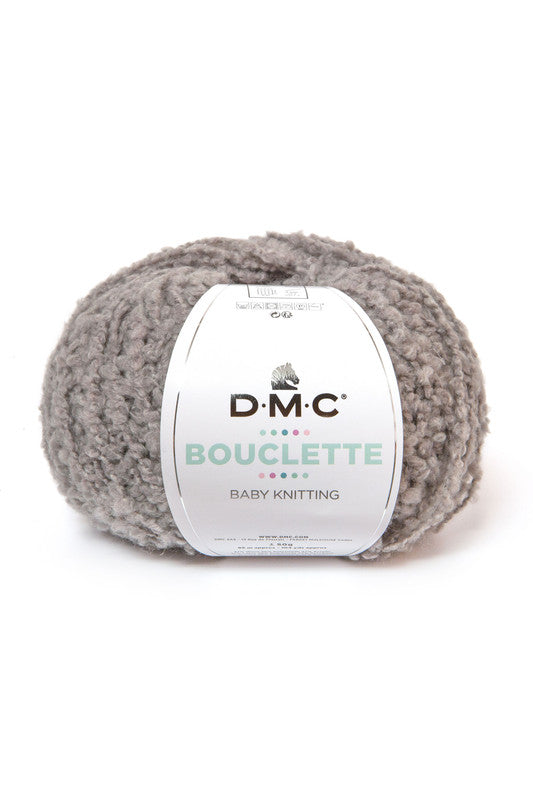 Ovillo de 37% lana 36% poliamida y 27% acrílico de la marca DMC. El modelo es Bouclette en el color 122