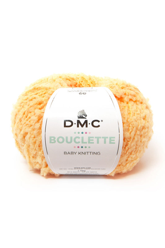 Ovillo de 37% lana 36% poliamida y 27% acrílico de la marca DMC. El modelo es Bouclette en el color 131