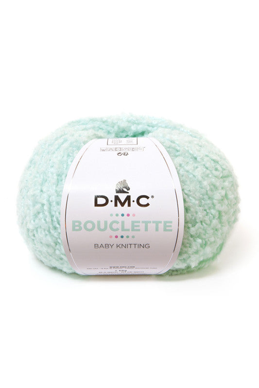 Ovillo de 37% lana 36% poliamida y 27% acrílico de la marca DMC. El modelo es Bouclette en el color 138