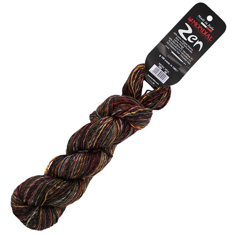 Ovillo 45% de lana merino, 45% acrílico, 7% poliamiday un 3% poliester, de la marca Mondial. El modelo es ZEN en el color 090