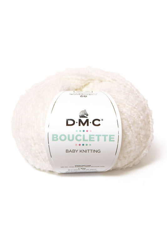 Ovillo de 37% lana 36% poliamida y 27% acrílico de la marca DMC. El modelo es Bouclette en el color 001
