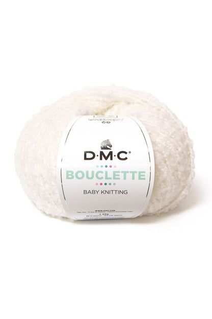 Ovillo de 37% lana 36% poliamida y 27% acrílico de la marca DMC. El modelo es Bouclette en el color 001