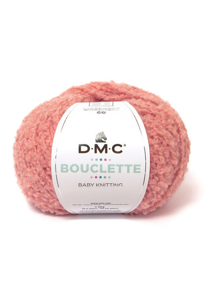 Ovillo de 37% lana 36% poliamida y 27% acrílico de la marca DMC. El modelo es Bouclette en el color 004