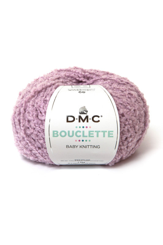 Ovillo de 37% lana 36% poliamida y 27% acrílico de la marca DMC. El modelo es Bouclette en el color 041