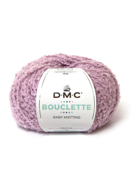 Ovillo de 37% lana 36% poliamida y 27% acrílico de la marca DMC. El modelo es Bouclette en el color 041