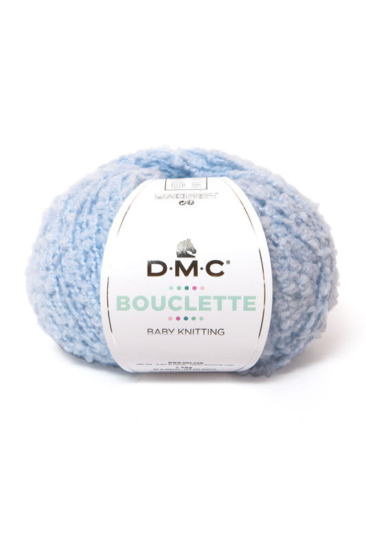 Ovillo de 37% lana 36% poliamida y 27% acrílico de la marca DMC. El modelo es Bouclette en el color 107