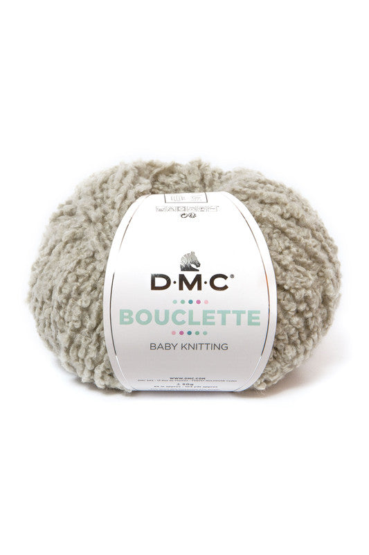 Ovillo de 37% lana 36% poliamida y 27% acrílico de la marca DMC. El modelo es Bouclette en el color 112