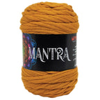 Ovillo de trapillo 60% Poliamidade, 40% la marca Mondial. El modelo es Mantra en el color 562