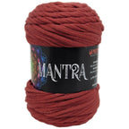 Ovillo de trapillo 60% Poliamidade, 40% la marca Mondial. El modelo es Mantra en el color 569